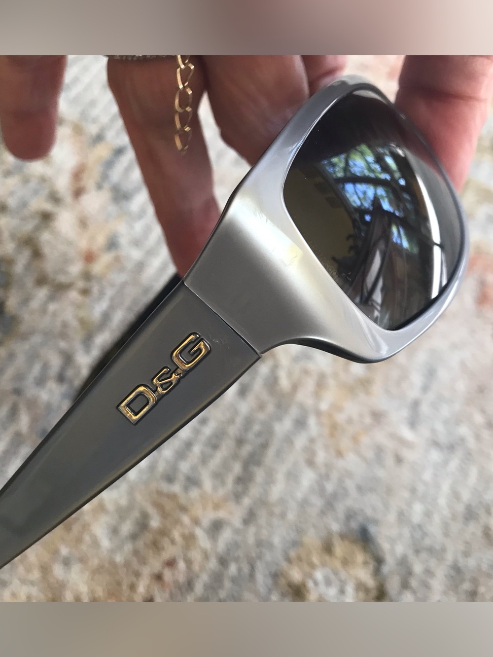 Vintage Dolce & Gabbana grey wrap around sunglasses.